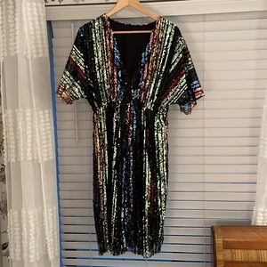 Sequin cocktail dress with front slit